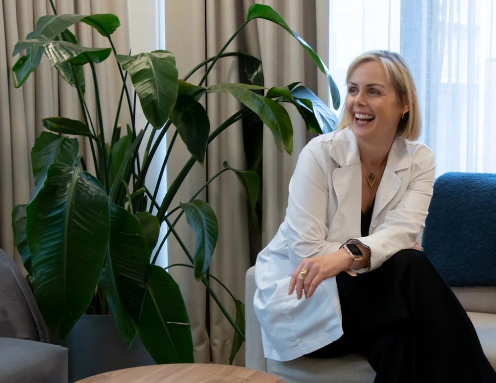 A Complete Health Clinic therapist relaxing in the clinic lounge